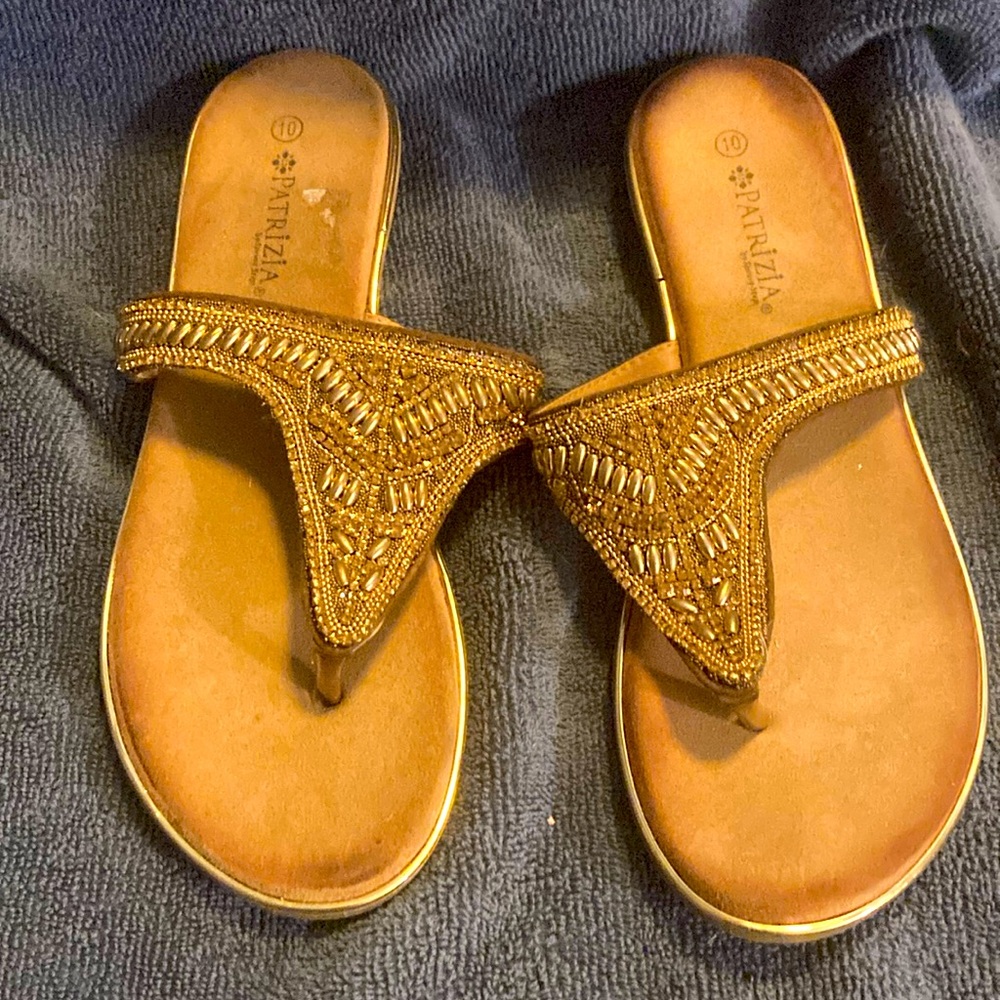 Gold Patrizia sandals.